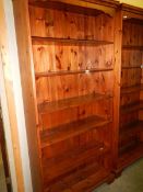 A good quality tall pine book case. COLLECT ONLY.