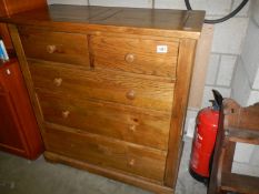 A two over three oak chest of drawers. COLLECT ONLY.