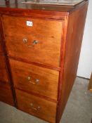 A three drawer wooden filing cabinet, COLLECT ONLY.