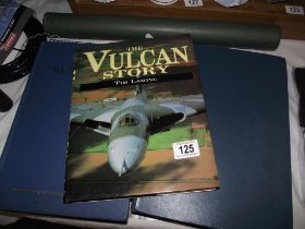 A hardback book about The Vulcan, plus a calendar from 1986 and a print, also Janes world of