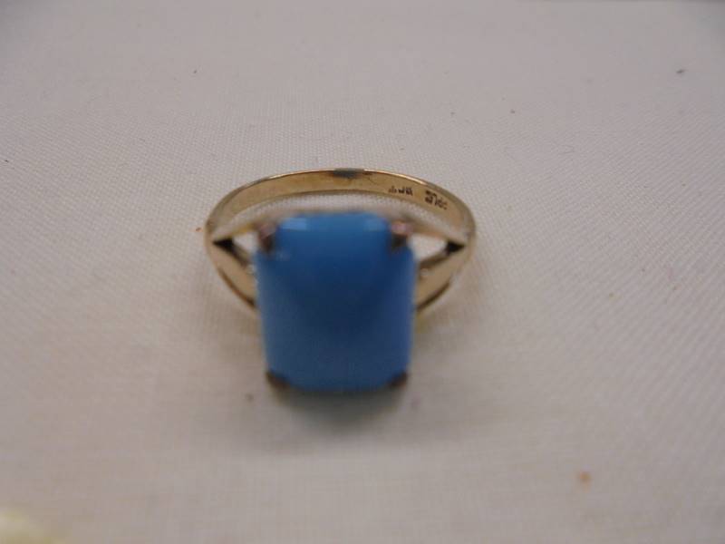 A vintage ring set with a turquoise coloured stone, stamped 9ct with openwork shoulders, size K, 2.2 - Image 2 of 2