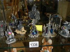 A quantity of pewter dragons and wizards including a Magic of Glastonbury limited edition dragon.