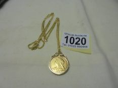 A Victoria (1900) gold sovereign in a 9ct gold pendant mount on a 9ct gold chain.
