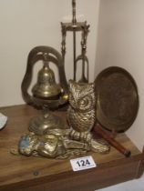 A quantity of brass items including Lincoln Imp door knocker, miniature companion set, owl etc