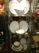 In excess of thirty pieces of Wedgwood Chartley pattern dinnerware, COLLECT ONLY.