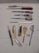 A mixed lot of vintage letter openers and penknives.