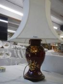 A vase shaped pottery table lamp with shade COLLECT ONLY.