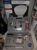 A cased plumbers set (some parts may be missing ) and a family toilet seat COLLECT ONLY