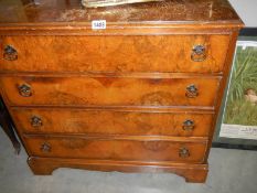An early 20th century four drawer walnut chest, a/f. COLLECT ONLY.