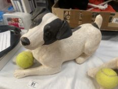 A Jack Russell dog figure with tennis ball