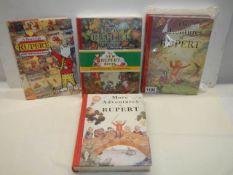 Four Rupert Bear books.