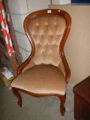 A 20th century spoon back chair.