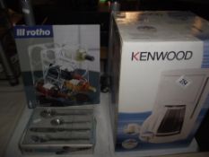 A new boxed Kenwood coffee maker, wine rack and box of cutlery
