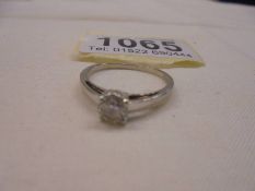A 9ct gold ring set single white stone, size R, 2 grams.