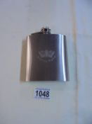 A Royal Navy stainless steel hip flask.
