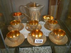 A Jersey Pottery circa 1970's gilded coffee set.