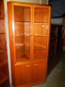 A good quality teak corner display cabinet, COLLECT ONLY.