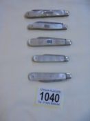 Five silver and mother of pearl fruit knives - 1908, 1919, 1920, 1928 etc.,