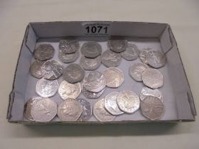 A collection of 30 fifty pence coins including Beatrix Potter, Paddington Bear etc.,
