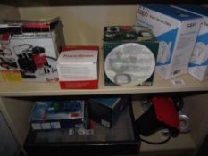 A quantity of misc boxed items including electric chain saw sharpener (unboxed), solar lights etc