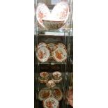 In excess of 45 pieces of circa 1960's Japanese porcelain red & white design dinner ware, COLLECT
