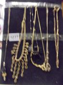 Six assorted vintage necklaces.