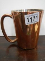 A vintage Rhodesian copper tankard.