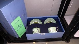 A boxed set of 2 Wedgwood Millenium cups and saucers