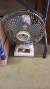 A power stretcher electric desk fan