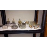 A quantity of jewellery trinket boxes, perfume bottles and vintage glasses