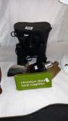 A pair of Prinz binoculars 13 x 50, 3 spirit flasks and a magnifying glass