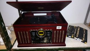 A 20th century record player / radio. COLLECT ONLY.