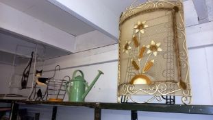 A quantity of retro metal household items including shoe rack and fire screen. COLLECT ONLY.