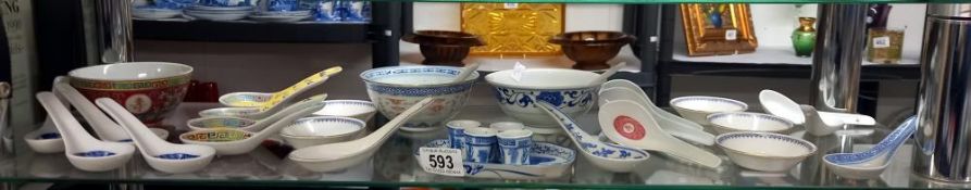 A quantity of Chinese rice/soup bowls and spoons etc