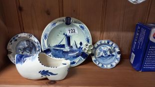 4 pieces of Delft blue and white pottery