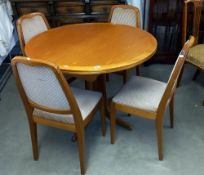 A round extending teak dining table and 4 chairs COLLECT ONLY