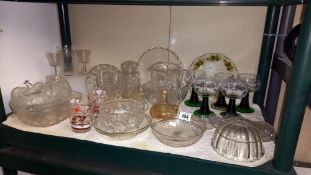 A selection of glass ware including jelly mould, wine glasses etc