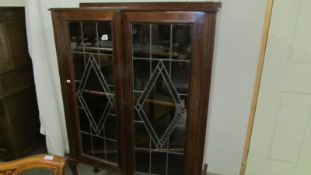 A lead glazed display cabinet. COLLECT ONLY.