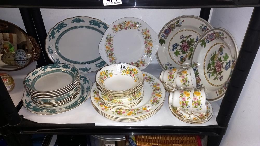 A Booths dragon part dinner set and a Colclough floral dinner ware set