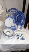 A quantity of blue and white china/pottery etc