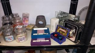A good lot of candles, including Yankee, plus scented tealights, room spray, tealight holders