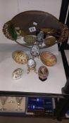 A quantity of egg trinket boxes and a mirrored tray etc