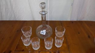 A decanter and set of 4 and 2 glasses
