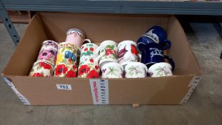 A quantity of mugs