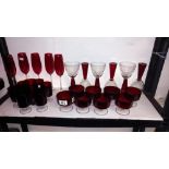 A good lot of red glass including champagne flutes, sundae dishes etc