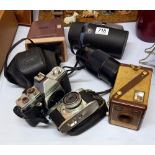 A quantity of cameras, lens and viewfinder