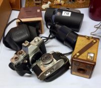 A quantity of cameras, lens and viewfinder