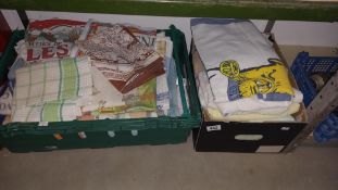 A box of towels and tea towels