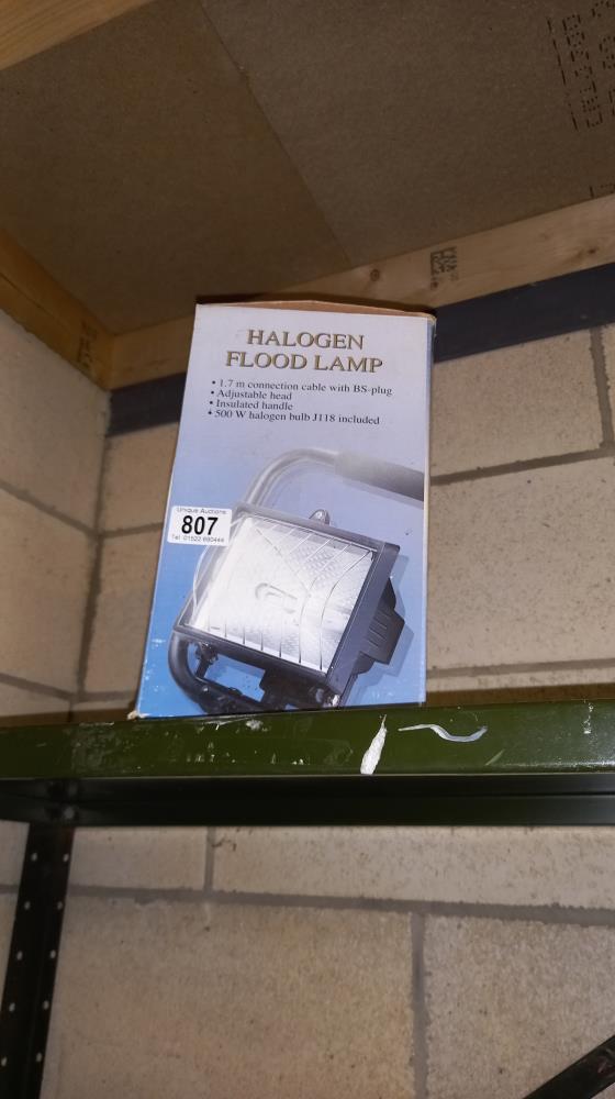 A boxed halogen flood light COLLECT ONLY