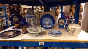 A shelf of vases, plates, ginger jars etc